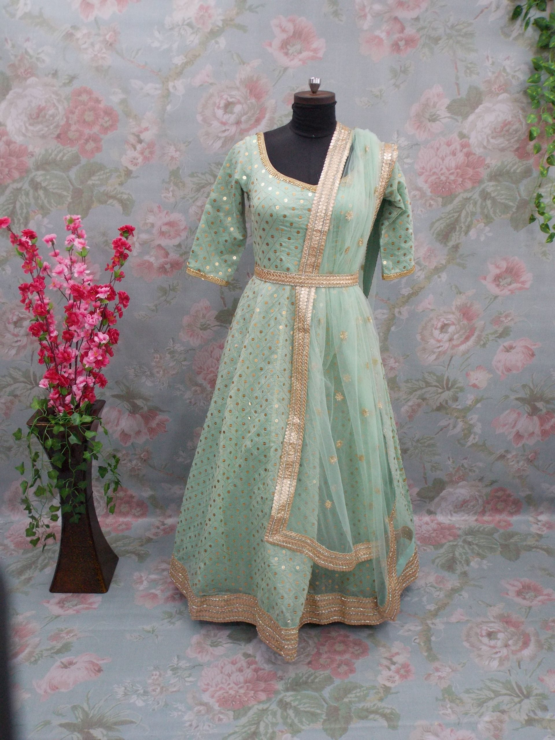 Introducing Pista Green Chaderi Silk Party Wear Gown - 113351: The Ultimate Partywear Gown for 2024 Dulhan Exclusives Introducing Pista Green Chaderi Silk Party Wear Gown - 113351: The Ultimate Partywear Gown for 2024 Dulhan Exclusives