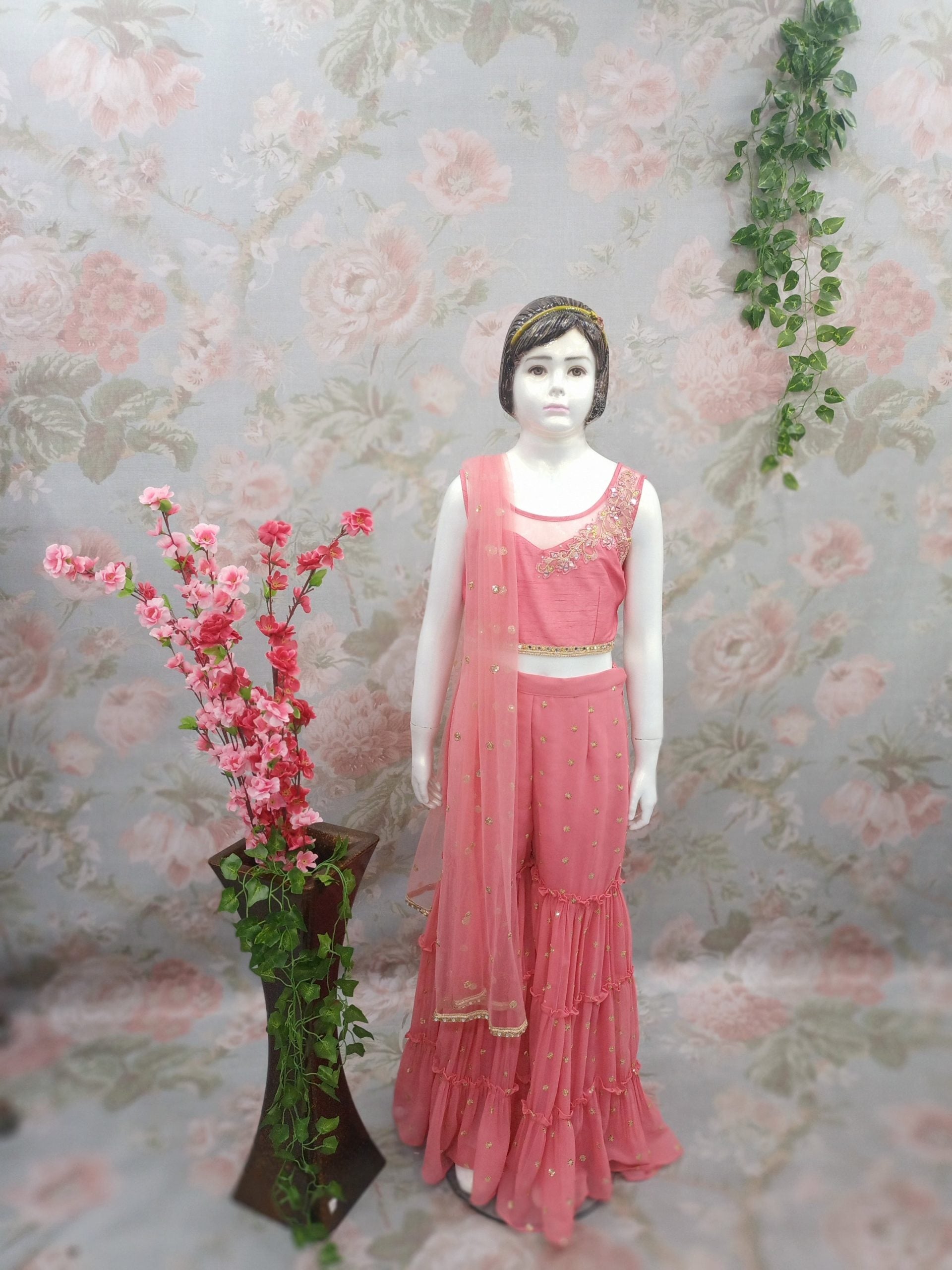 Pink sharara and crop top suit with work on Neckline