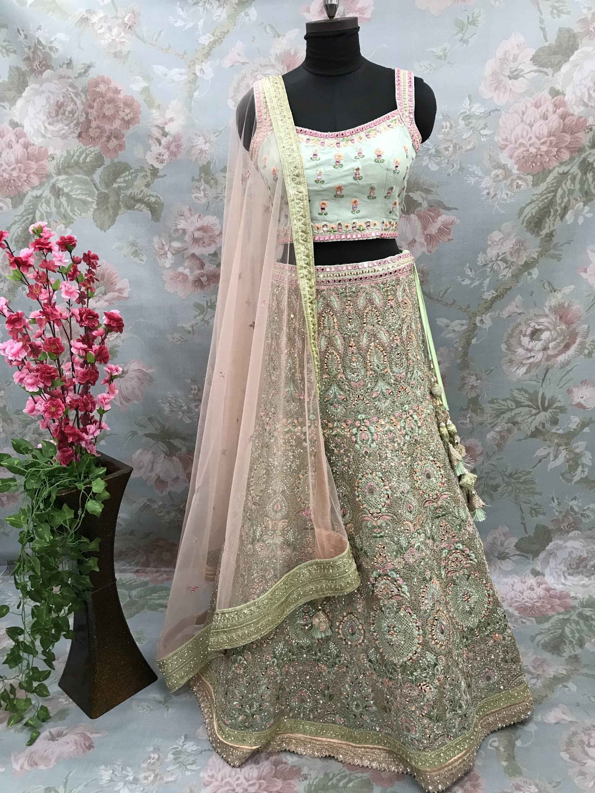 Bridal Lehenga Choli in Sage Green with multi color resham embroidery